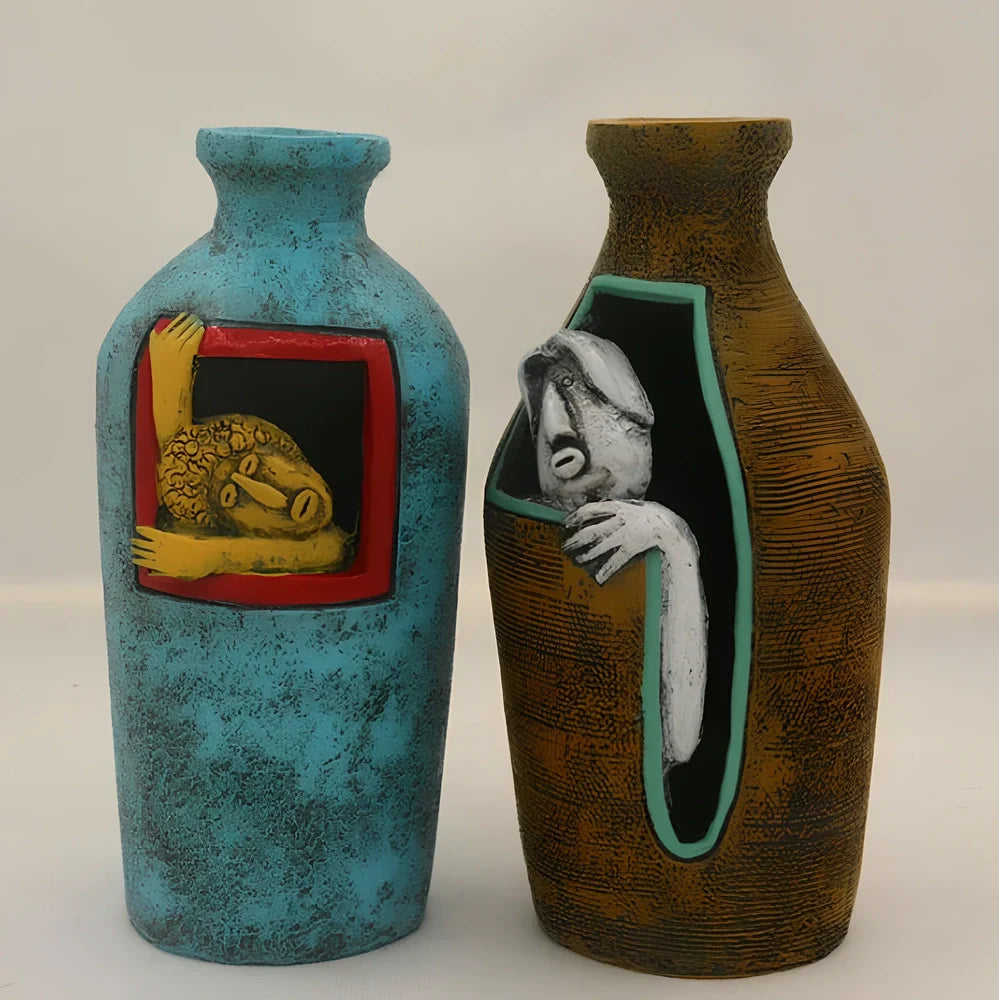 Blue hand-painted abstract resin wall vase measuring 18cm tall with pendant hanging form