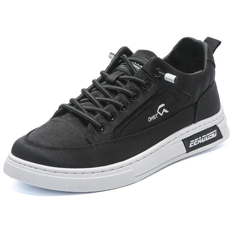 Grey men's low-top canvas casual trainers with lace-up front and round toe