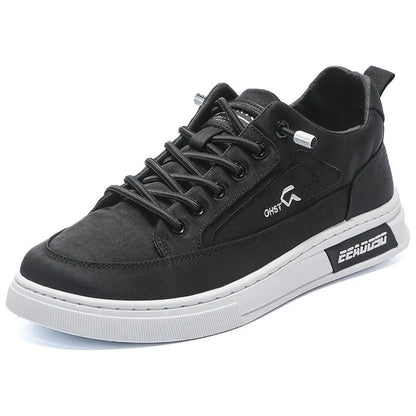 Grey men's low-top canvas casual trainers with lace-up front and round toe