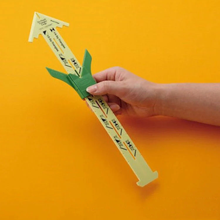 Versatile patchwork ruler with measurement markings, used for sewing, quilting, and crafting projects