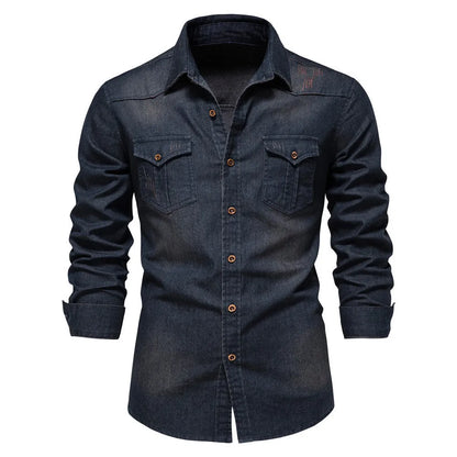 Men's solid colour slim fit cotton denim shirt with long sleeves and button front.