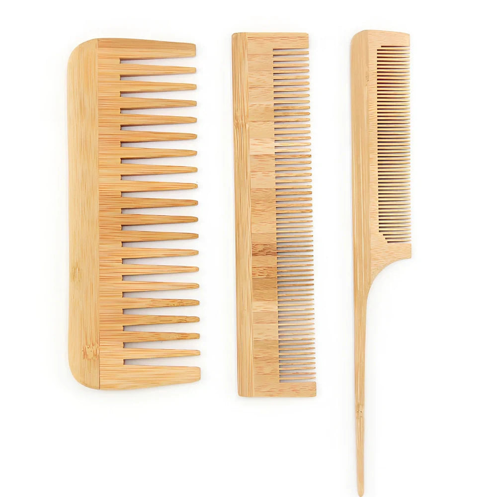 Yellow Phoebe wood massage comb set with three pieces showing rounded teeth and natural wood grain
