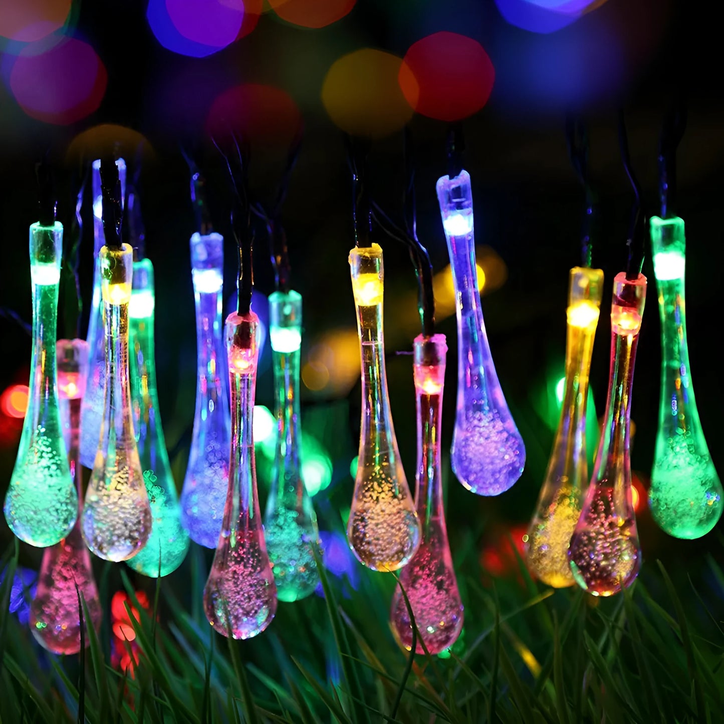LED outdoor water drops solar string lights with bubble drop pendants on 6.5m cable, solar panel and ground spike included