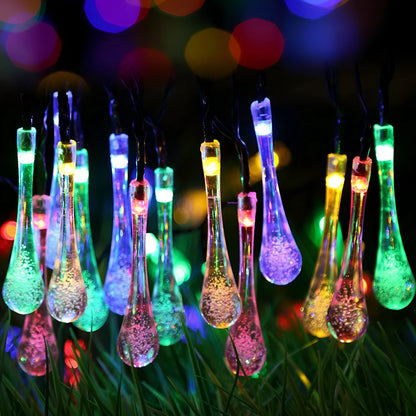 LED outdoor water drops solar string lights with bubble drop pendants on 6.5m cable, solar panel and ground spike included
