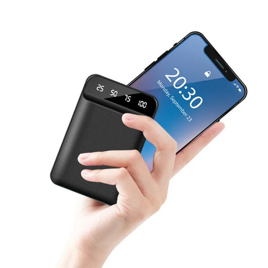 Mini power bank in black with dimensions 93x63x22mm showing USB ports for charging devices