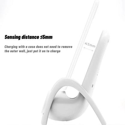 Wireless fast charging station with a stylish phone holder, designed for convenient and safe charging on a desk or table