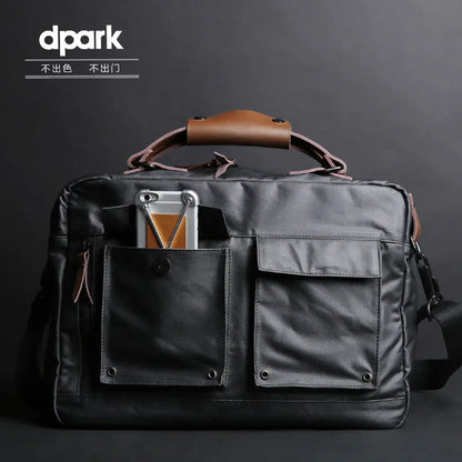 Dpark black single shoulder laptop bag for a 14 or 15 inch Lenovo laptop.