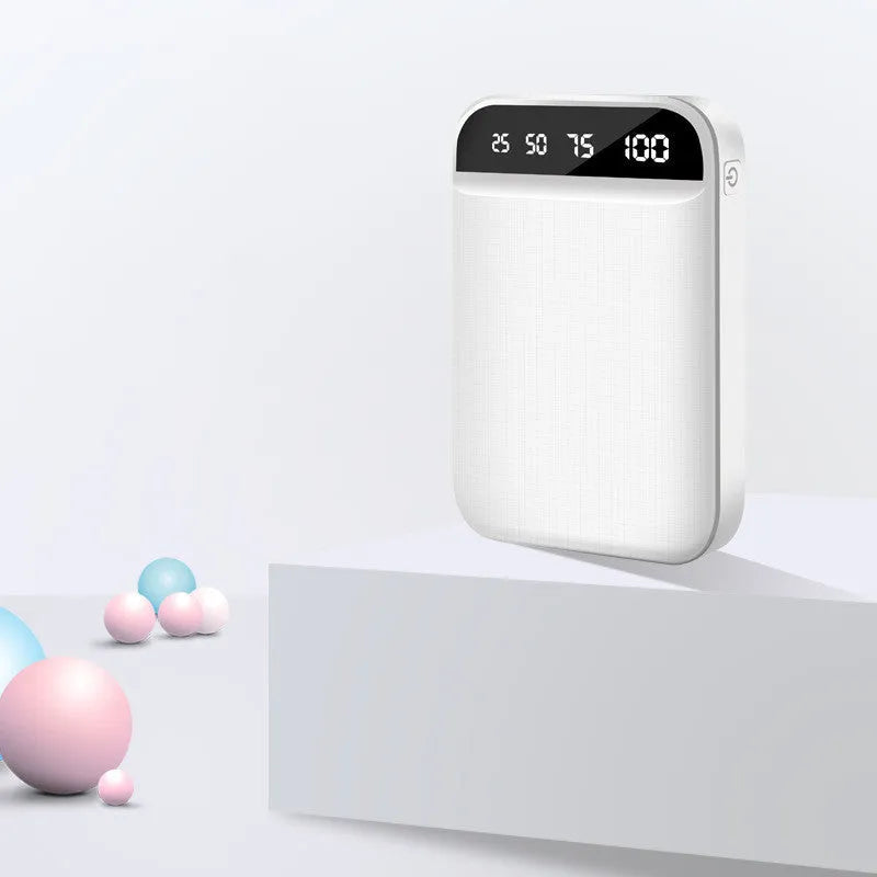 Mini power bank in black with dimensions 93x63x22mm showing USB ports for charging devices