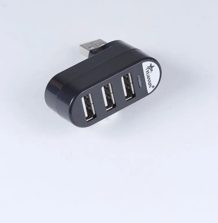 A black and a white USB 2.0 hub splitter with multiple ports.