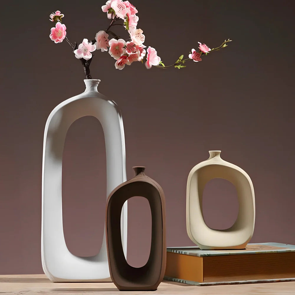 Three white ceramic vases with hand-drawn cloud patterns in 25cm, 20cm, 15cm sizes