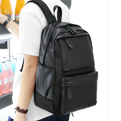 Black men's PU leather backpack with computer pocket and adjustable shoulder straps