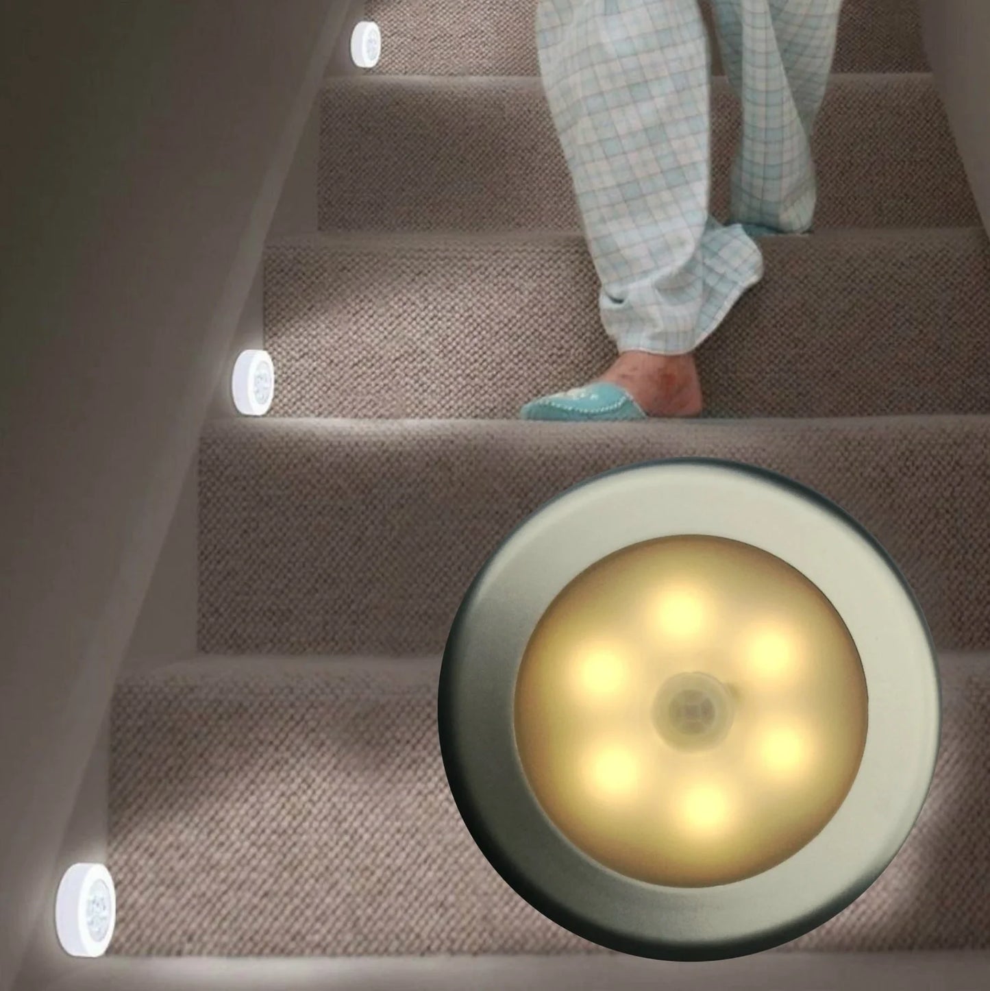 White motion-sensing LED cabinet lamp with magnetic back for wireless installation