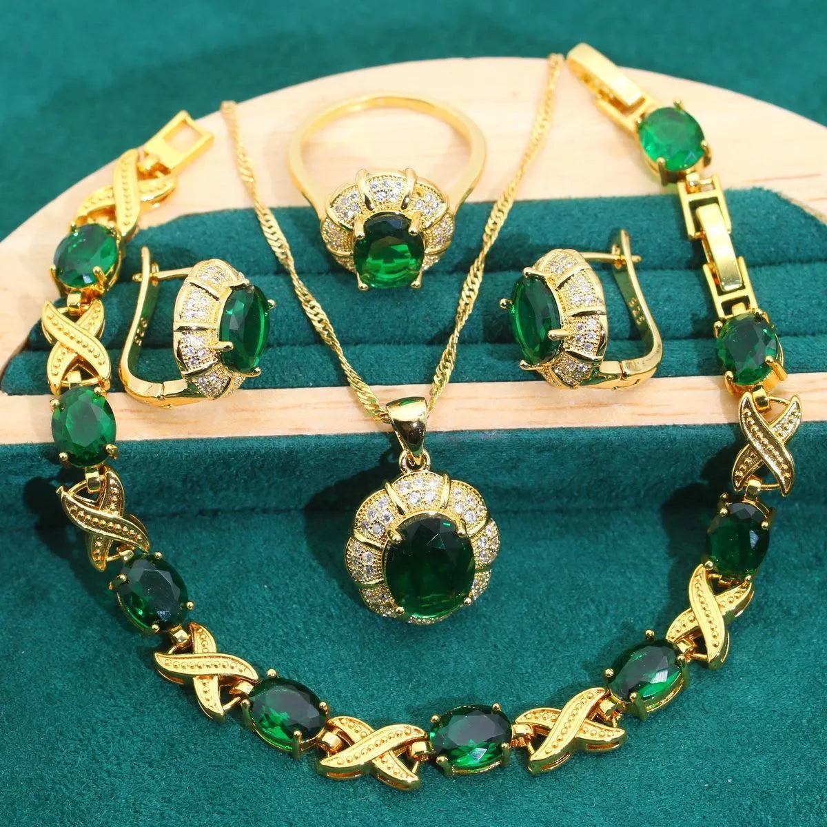 18k gold plated jewellery set with multi-colour synthetic cubic zirconia stones, including necklace, earrings, ring, and bracelet