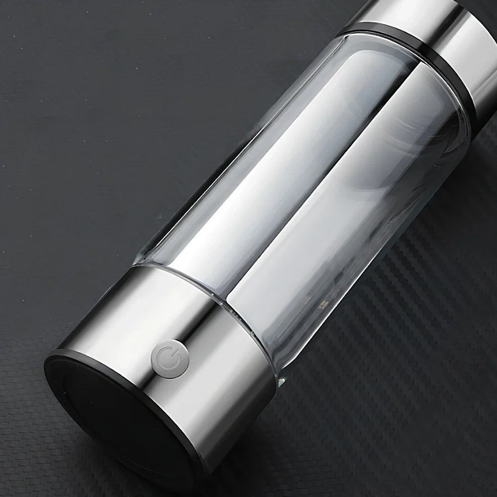 Portable hydrogen water cup in silver with borosilicate glass, showing electrolysis bubbles and romatic light, 3-minute generation