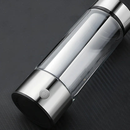 Portable hydrogen water cup in silver with borosilicate glass, showing electrolysis bubbles and romatic light, 3-minute generation