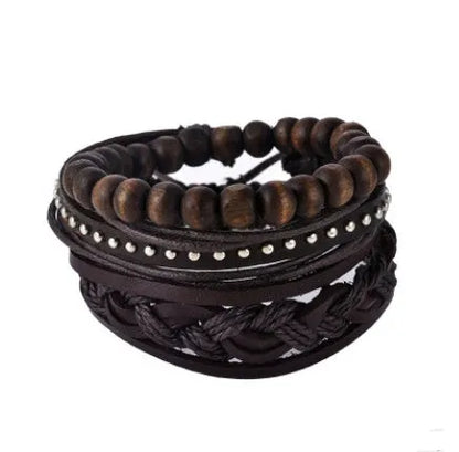 Hand-woven brown leather bracelet with wooden beads and rope detailing on a wrist.