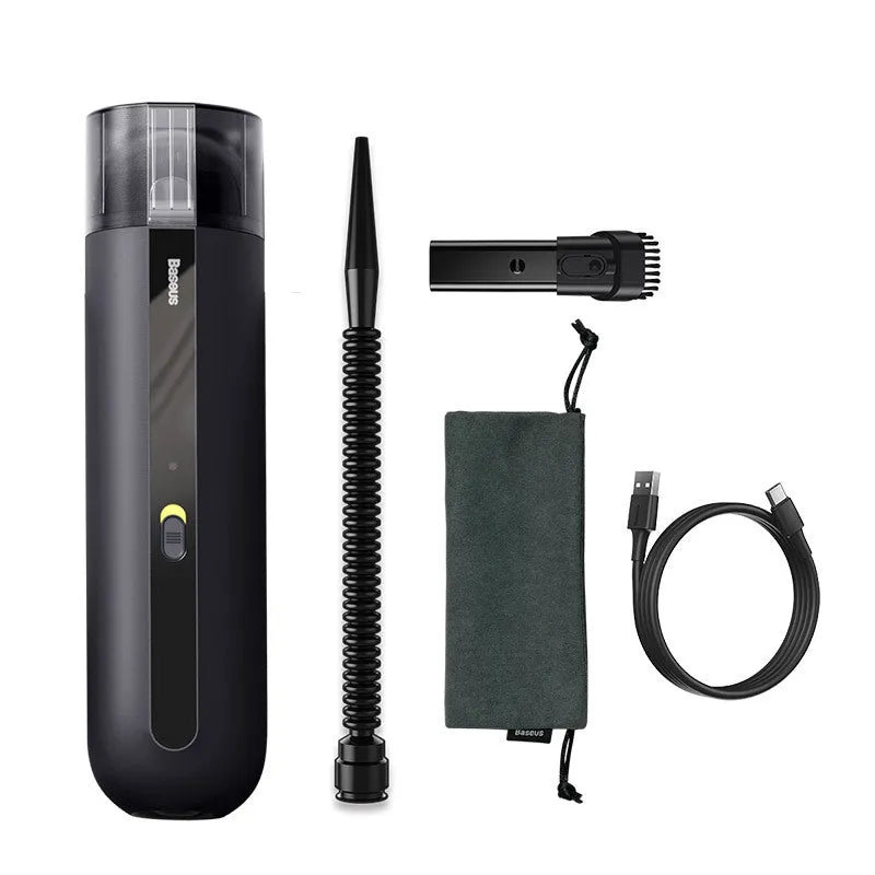 BASEUS handheld car vacuum cleaner in black with blowing hose attachment, showing compact size and dust bin