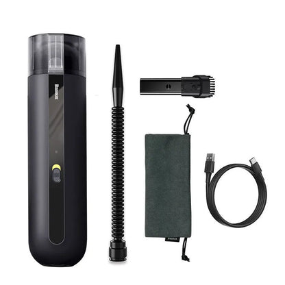 BASEUS handheld car vacuum cleaner in black with blowing hose attachment, showing compact size and dust bin