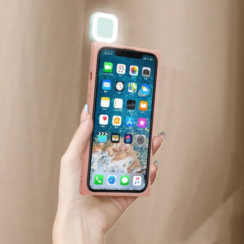 Mobile phone case with built-in ring flashing fill light, fashion back cover compatible with Apple iPhone 13, 13 Pro and 13 Pro Max models, solid colour design available in pink, pink green, white and white green.