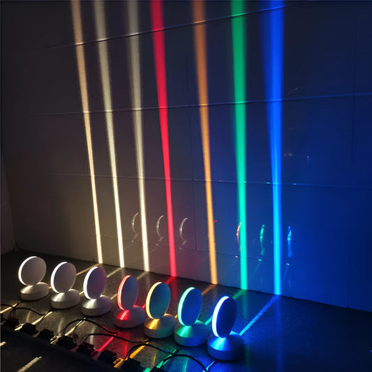 Aluminium and glass LED wall spotlight bar with colour change options, mounted on a corridor wall.