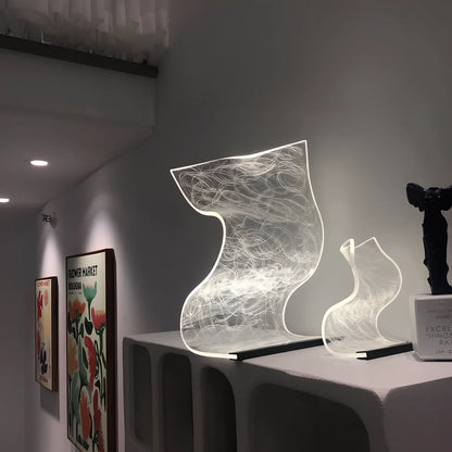 USB-powered bedside lamp with three-colour light adjustment in Nordic design