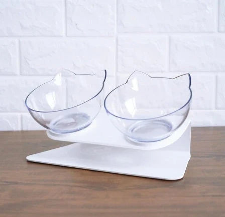 An inclined cat food bowl with a transparent design and a sturdy base, providing a comfortable and hygienic dining experience for your feline friend.