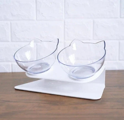 An inclined cat food bowl with a transparent design and a sturdy base, providing a comfortable and hygienic dining experience for your feline friend.