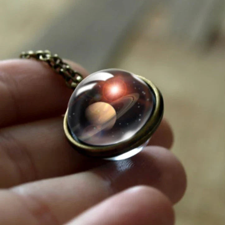Mesmerizing double-sided galaxy pendant necklace in various celestial patterns and colors