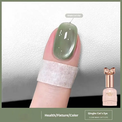 Bottle of micro glass bead cat's eye gel nail polish for magnetic nail art.