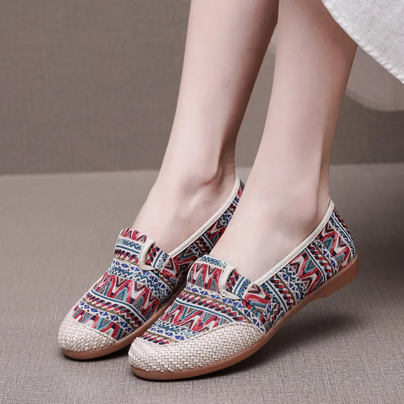 Women's ethnic style cloth shoes with shallow mouth design, colour stitching, and flat heel