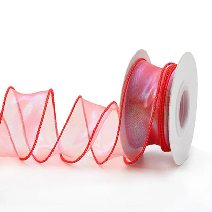 Fishtail yarn ribbon roll showing 4cm width and edge cutting detail in illusion colour options