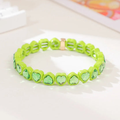 Rainbow enamel heart-shaped stretch bracelet in alloy with diamond process surface