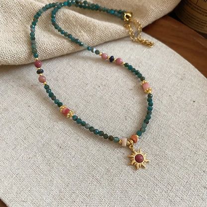 French court style freshwater pearl necklace with stone sun pendant on clavicle chain