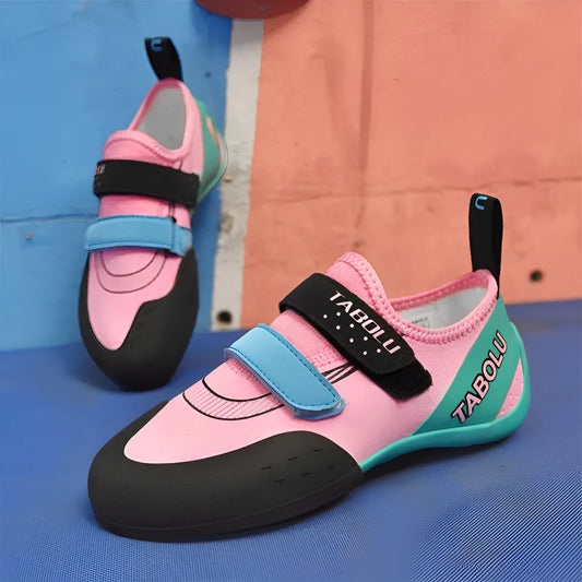 Beginner unisex rock climbing shoes with Velcro straps and a coloured rubber sole.