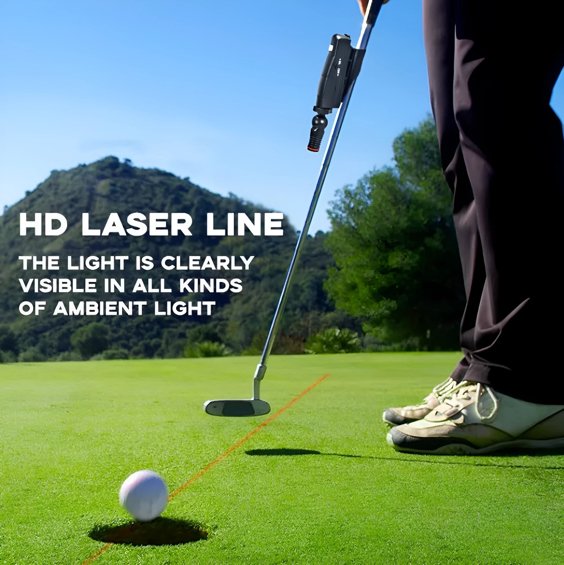 Black golf laser aiming sight with clip mount for putting alignment training.