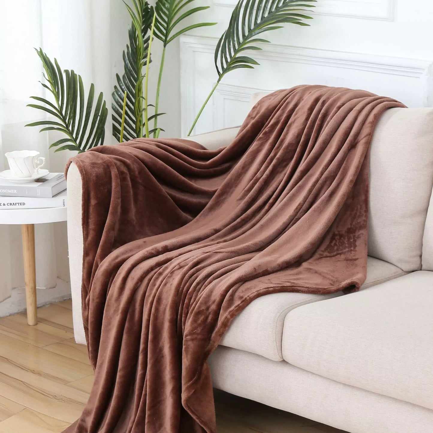 Solid color flannel blanket in various sizes and colors, made from durable polyester fiber