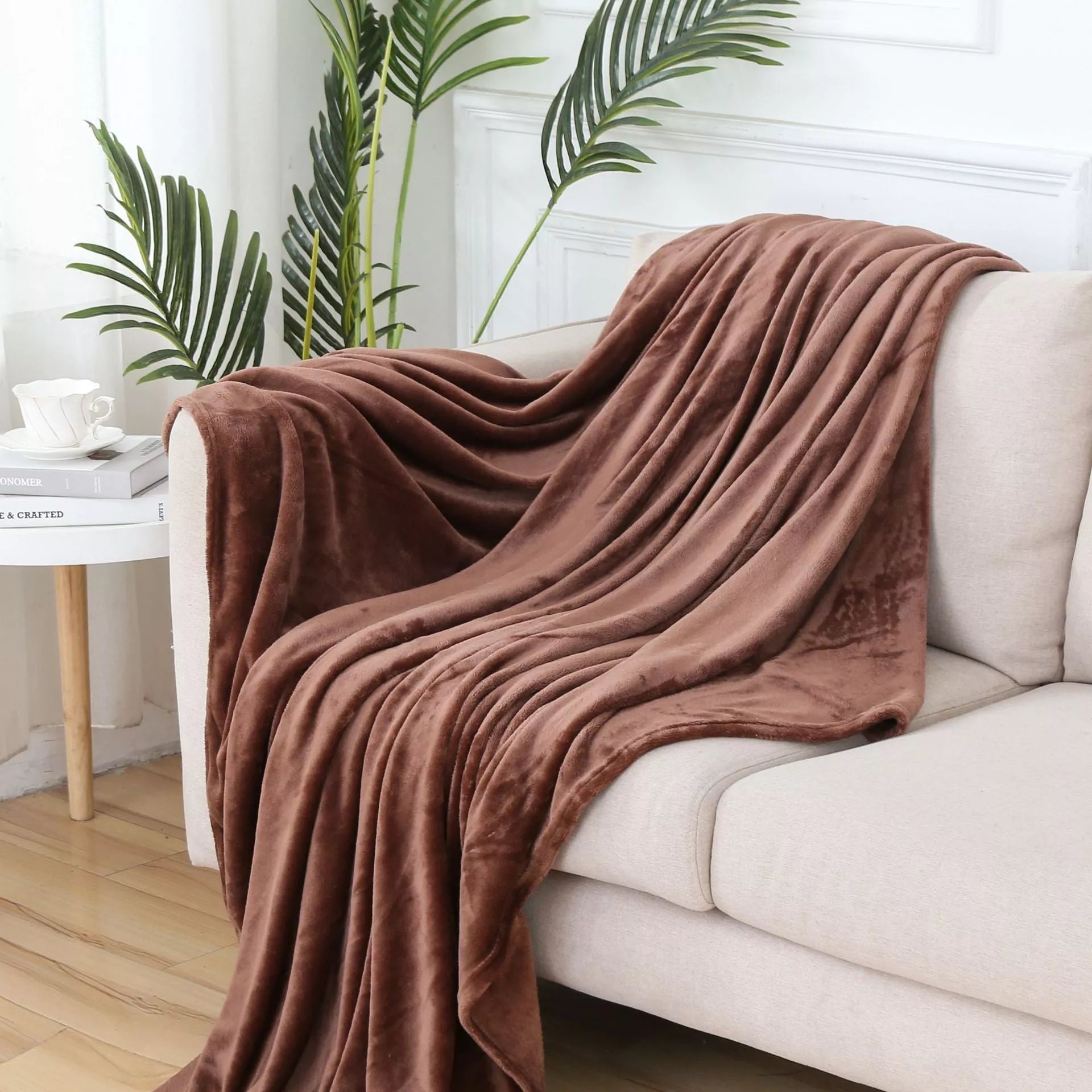 Solid color flannel blanket in various sizes and colors, made from durable polyester fiber