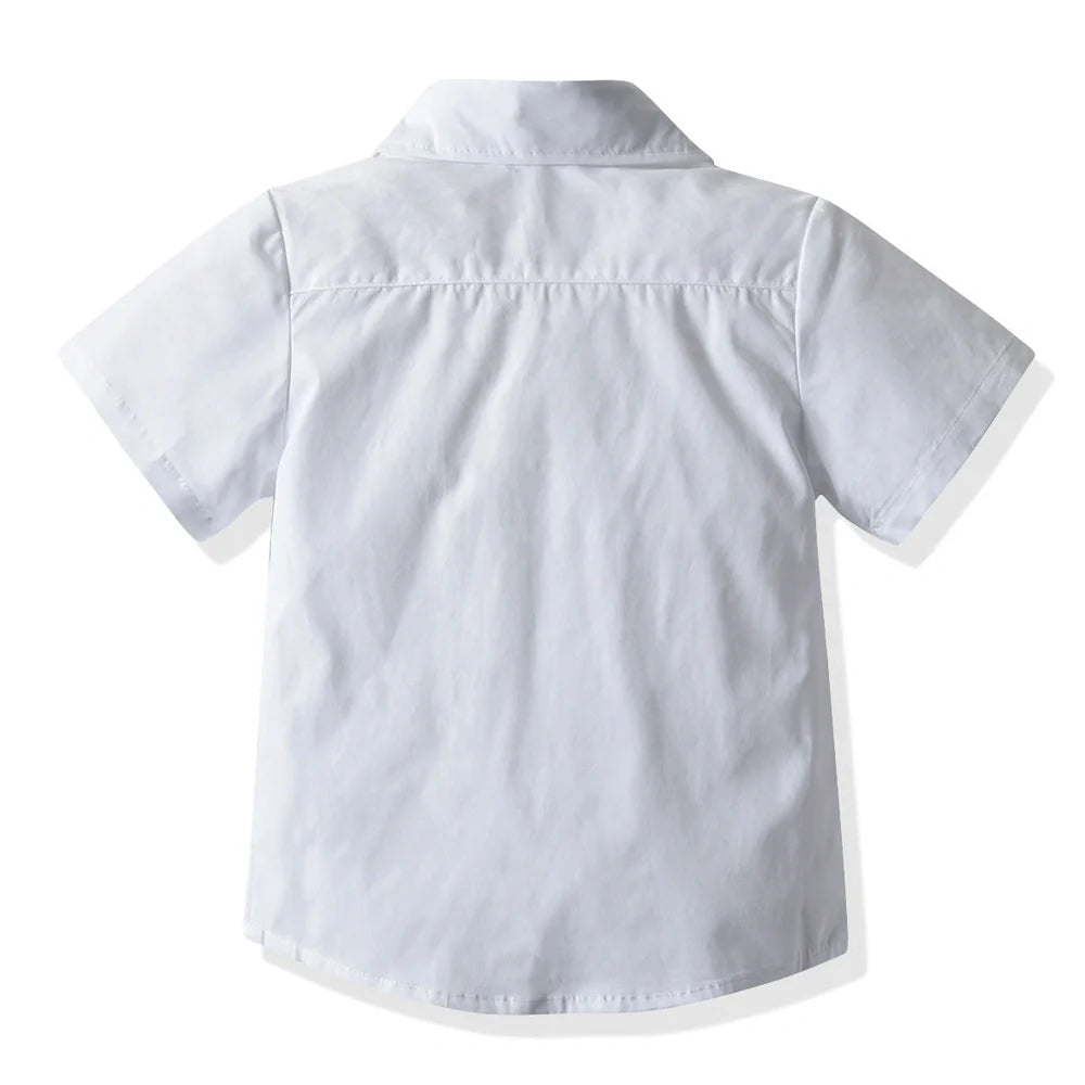 Boys' white short-sleeved shirt with suspender shorts set showing single-breasted closure and adjustable straps