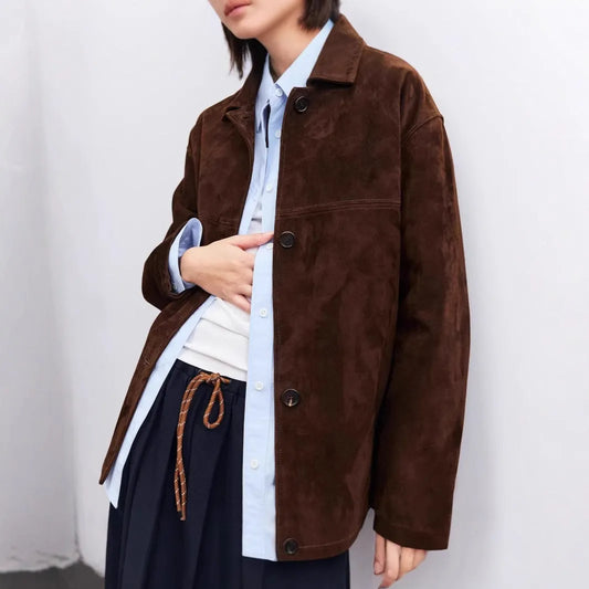 Yellow brown cashmere coat with Peter Pan collar and leather stitching details, belt at waist