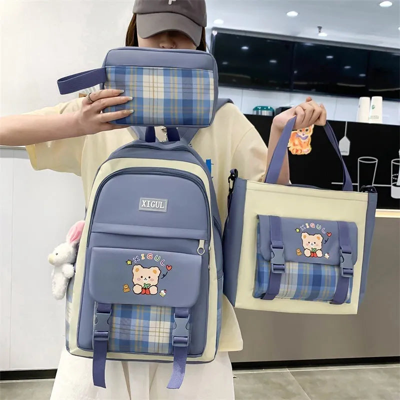 Large capacity plaid three-piece school backpack set in nylon with pink, blue, black, or purple colour options for junior high students