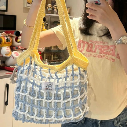 Handmade woven wool bag with floral pattern, approximately 0.5m tall