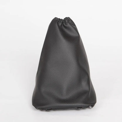 Black leather shift lever dust cover for Toyota Corolla, dimensions 15.2cm by 12.9cm.