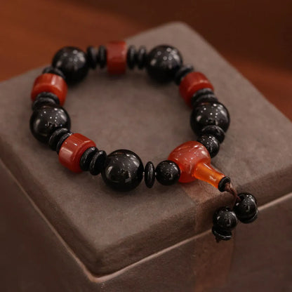 Natural agate ethnic bracelet with geometric design featuring multiple agate bead types and sizes