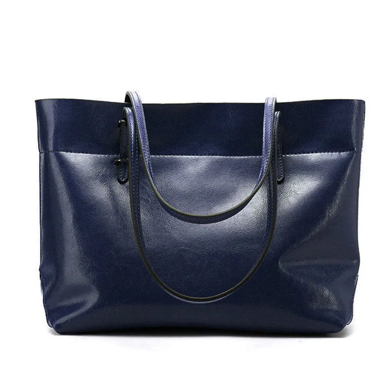 Leather cross-body handbag in Black colour with dimensions 30cm by 37cm by 13cm, showing internal pockets