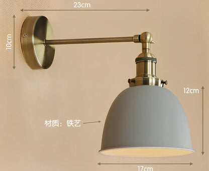 Bedroom light with adjustable iron shade in multiple colour options