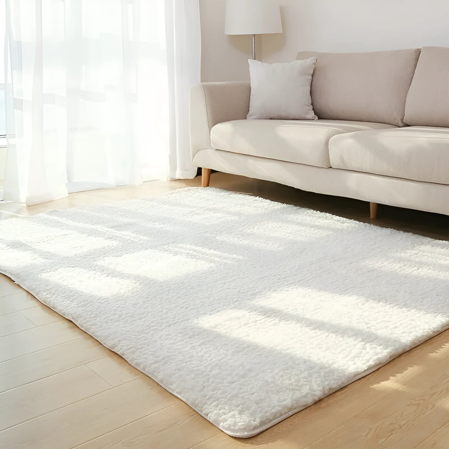 Solid colour plush area rug showing velvet pile texture and rectangular shape