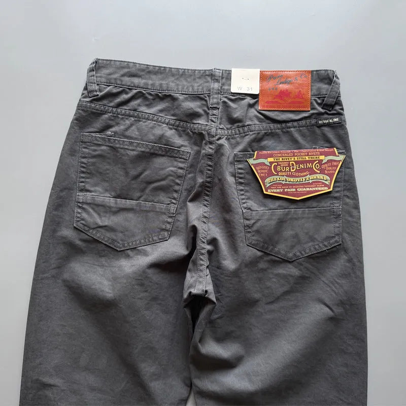 Men's straight leg casual cotton trousers in grey colour showing mid-waist fit and straight silhouette