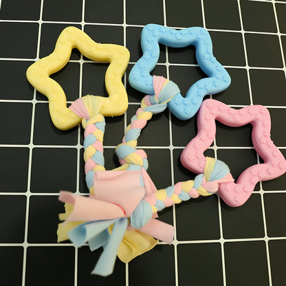 Non-toxic rubber dog chew toys in star, ring and ball shapes with textured cleaning surface
