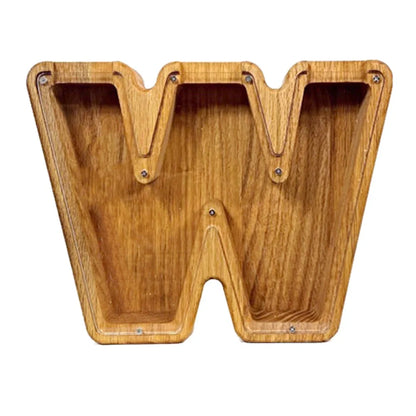 Handmade wooden letter piggy bank with personalised initial, showing 15cm height and 5cm coin slot for UK coins