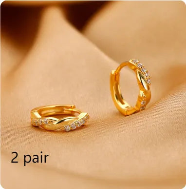 Gold geometric interwoven earrings with 1.5cm diameter hemp rope pattern and diamond-treated copper surface